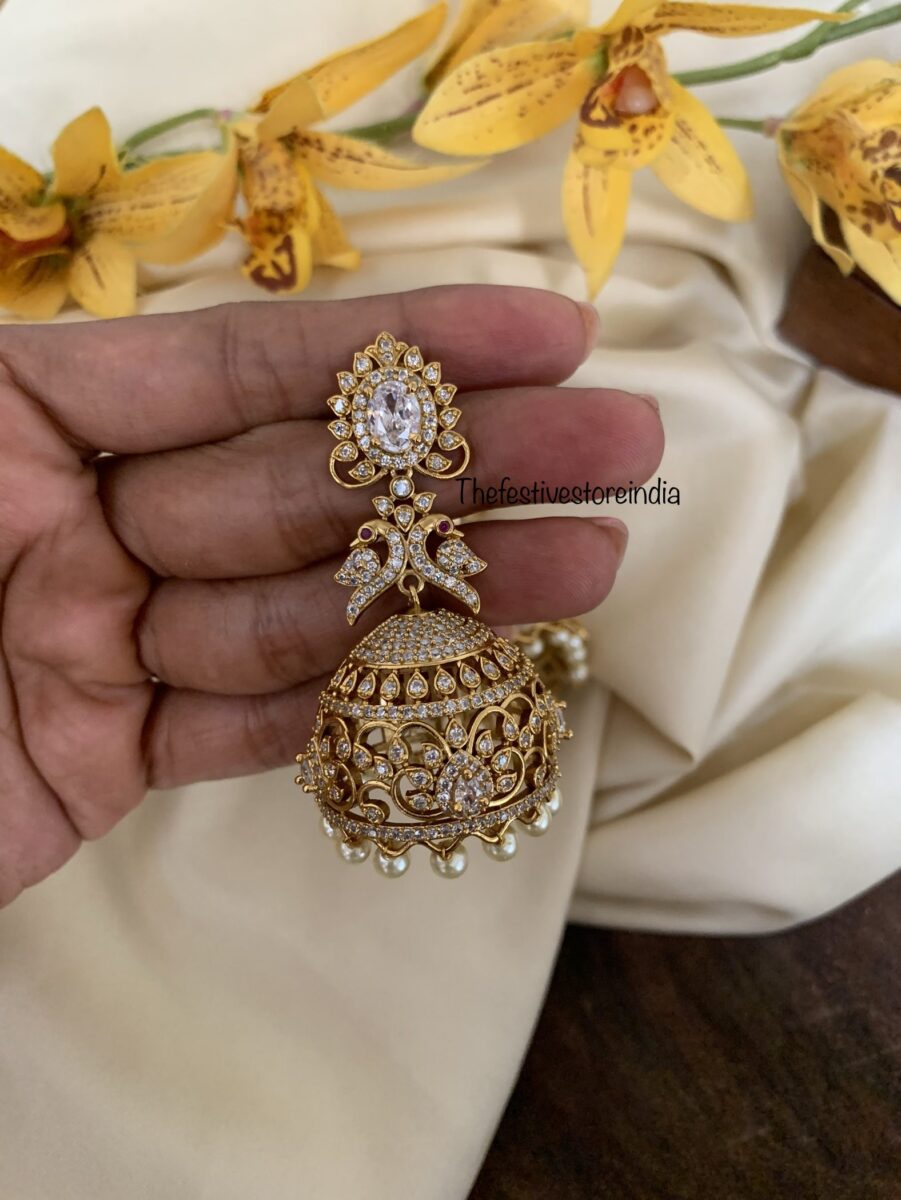AD white jhumkas