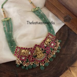 Green jadau lakshmi ambaari necklace with pumpkin bead drops