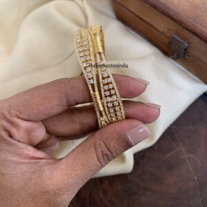 Designer gold polish AD bangles