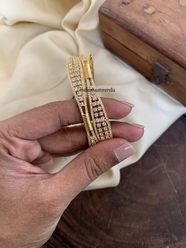 Designer gold polish AD bangles