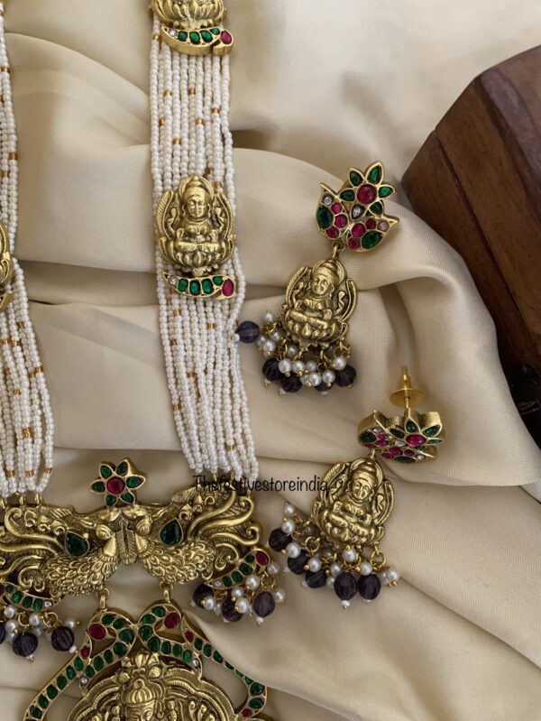 Jadau white pearls purple beads Lakshmi haaram set