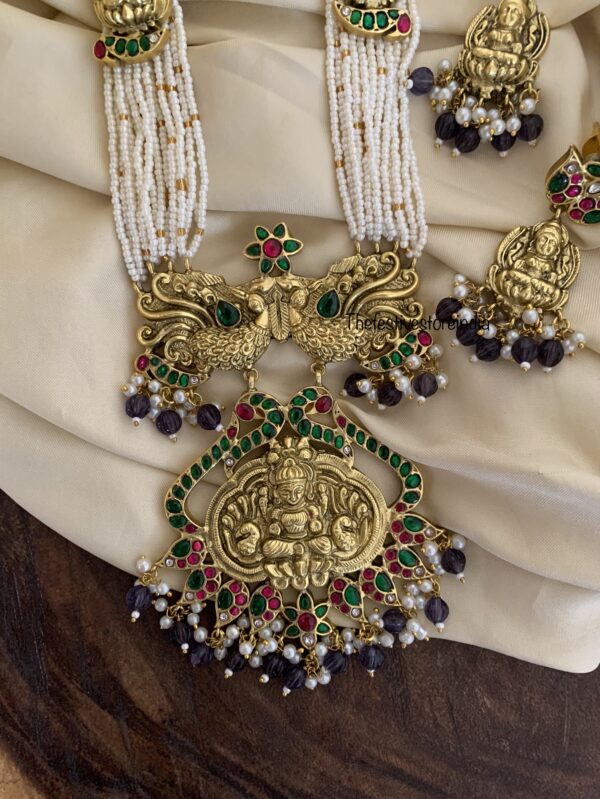 Jadau white pearls purple beads Lakshmi haaram set
