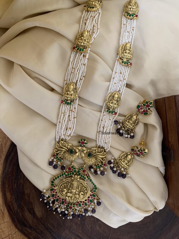 Jadau white pearls purple beads Lakshmi haaram set