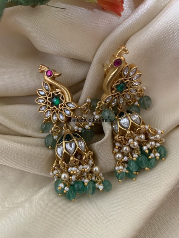 Jadau green drops peacock jhumkas