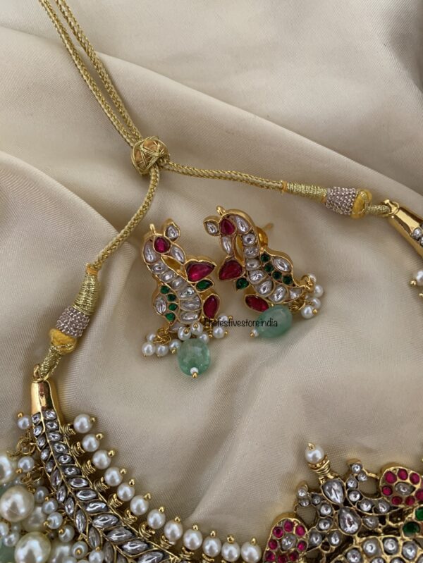 Jadau bridal all white pastel green drops kanti set
