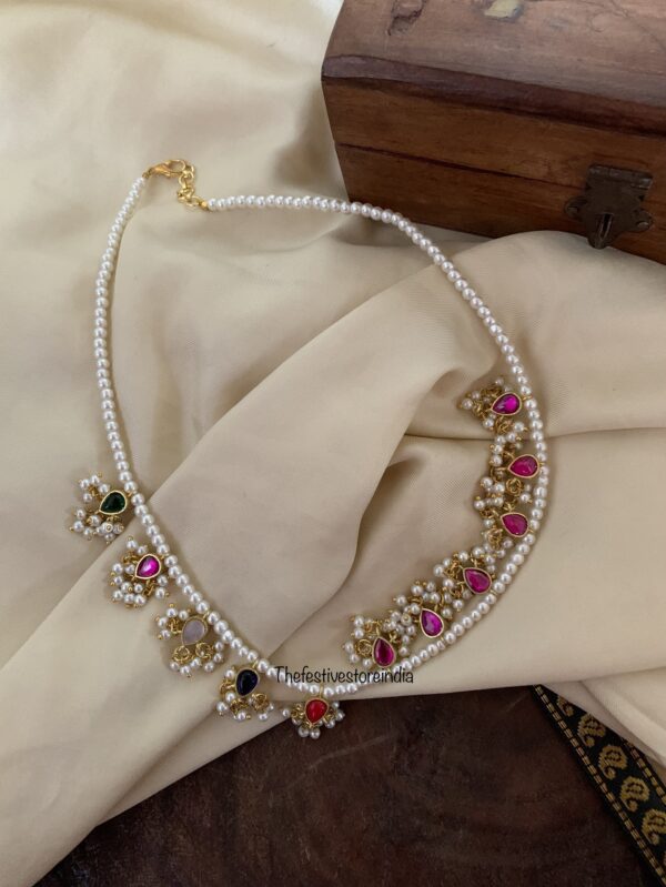 Jadau Kemp and Navarathna reversible chain
