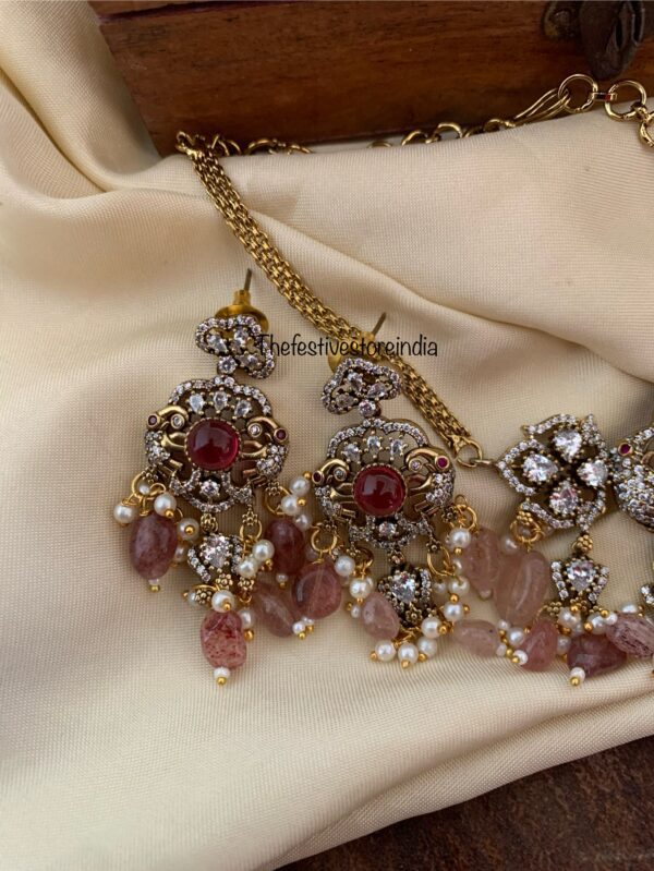 Budgeted Victorian asymmetric pink drops choker set