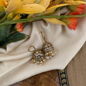 An all white hook jhumkas