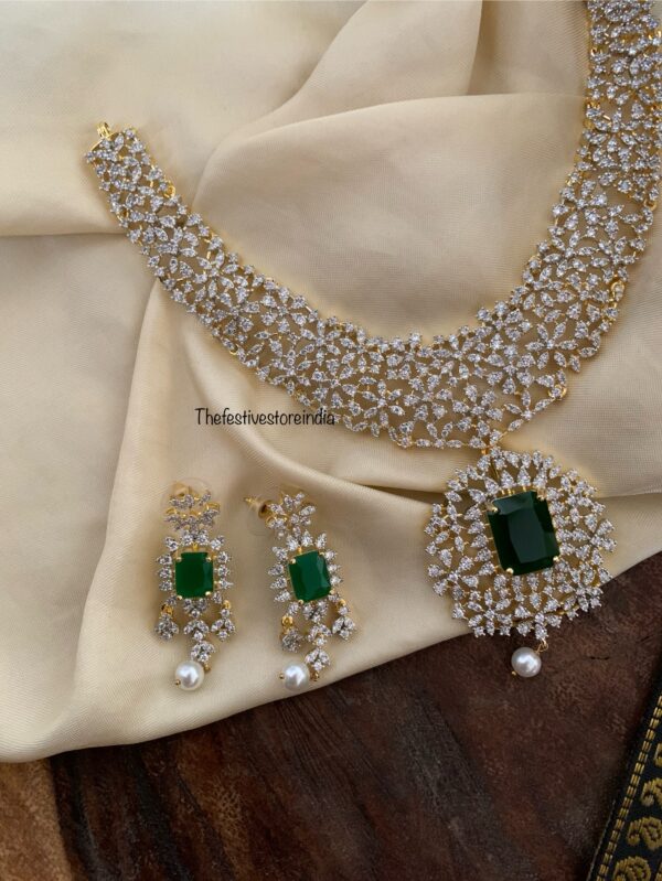 Gold polish Diamond emerald stone necklace set