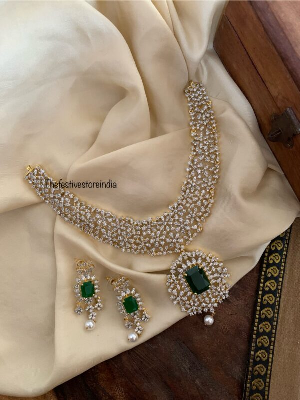 Gold polish Diamond emerald stone necklace set