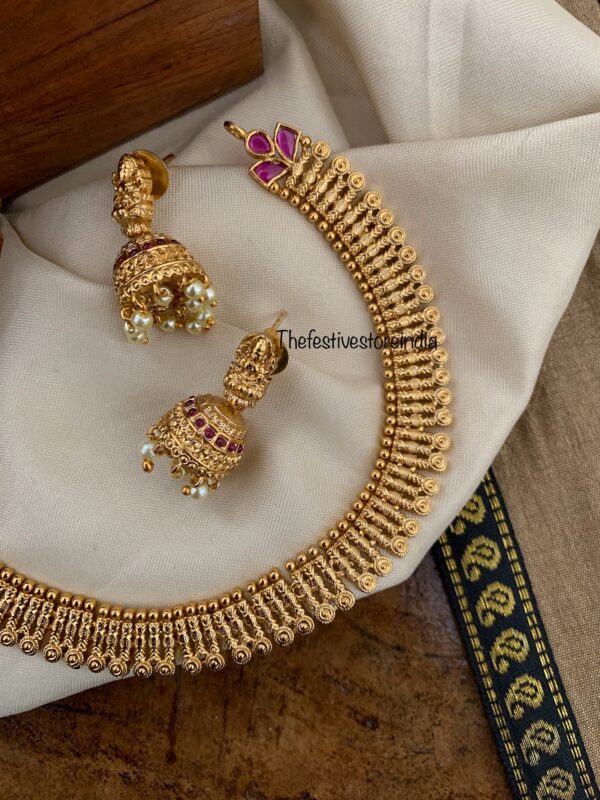 Simple gold look alike chain with lakshmi jhumkas