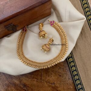 Simple gold look alike chain with lakshmi jhumkas