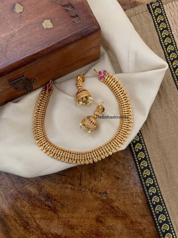 Simple gold look alike chain with lakshmi jhumkas
