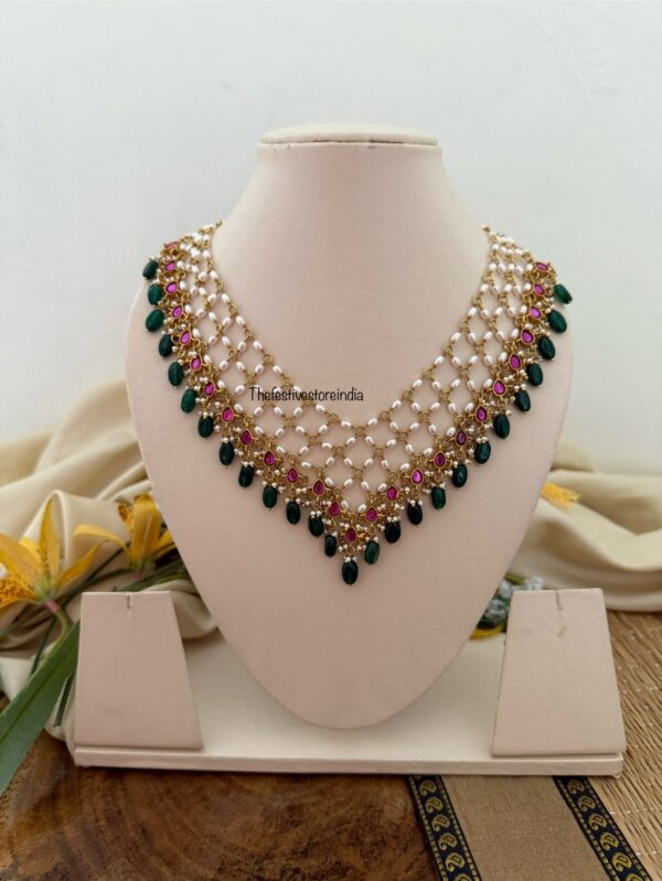 Close knit Jadau pearls with kemp stones green drop hanging chain | Unique