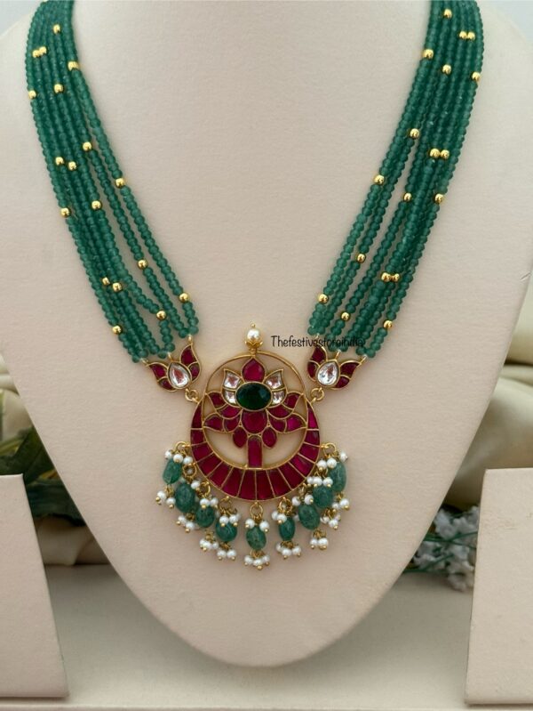 Mid length big Jadau pendant green haaram with screwback earrings