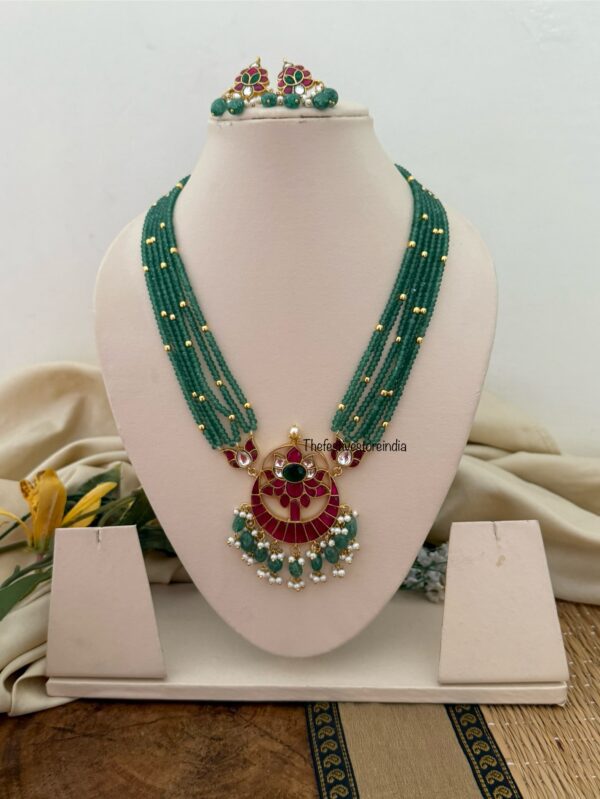Mid length big Jadau pendant green haaram with screwback earrings