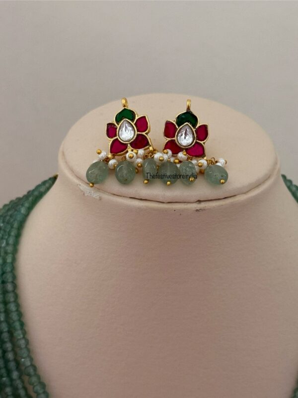 Classic Mid length Jadau pendant green haaram with screwback earrings
