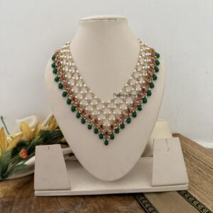 Close knit Jadau pearls with kemp stones green drop hanging chain | Unique