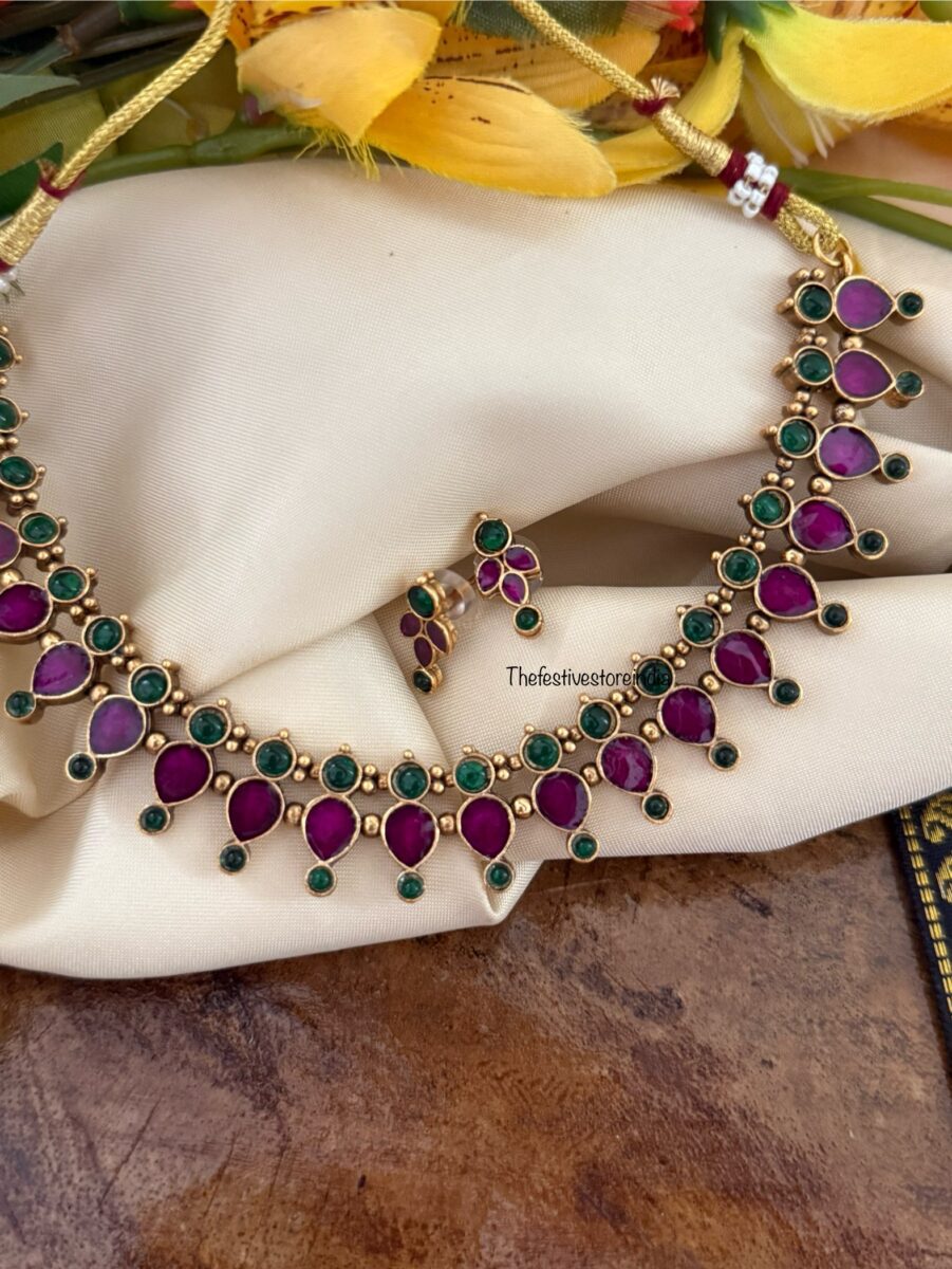 Budgeted Ruby and green stone necklace set