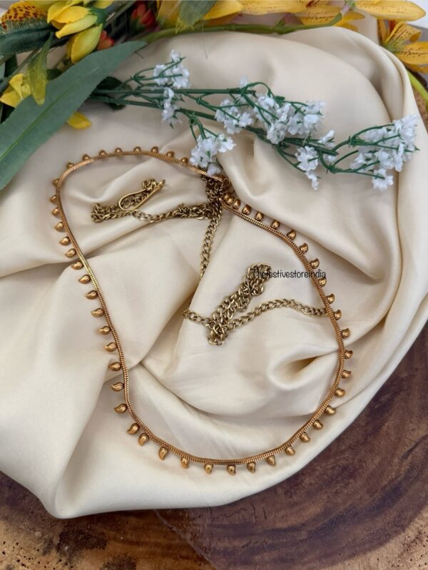 Budgeted simple Mango motif matte polish hip / waist chain