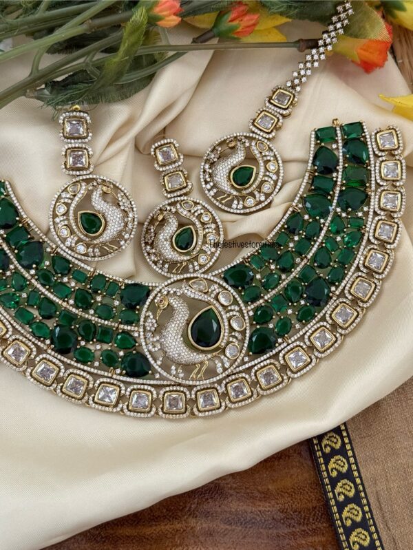 Prerana - Emerald peacock set with maangtikka