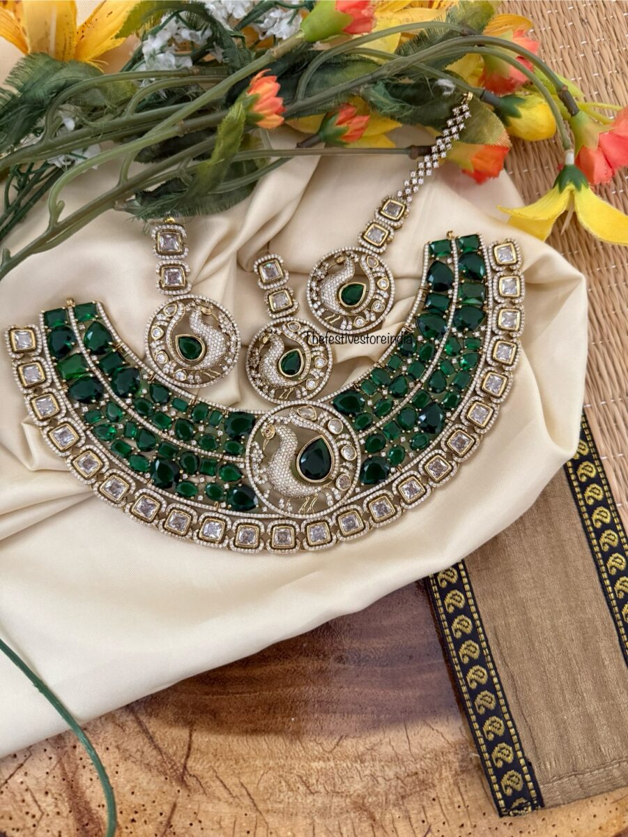 Prerana - Emerald peacock set with maangtikka