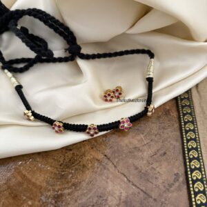 Jadau black thread floral motif chain with screwback matching earrings