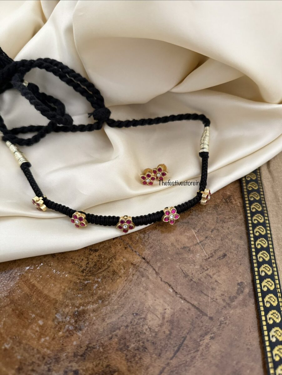 Jadau black thread floral motif chain with screwback matching earrings