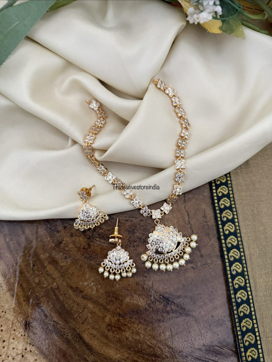 Gold look alike diamonds attigai set