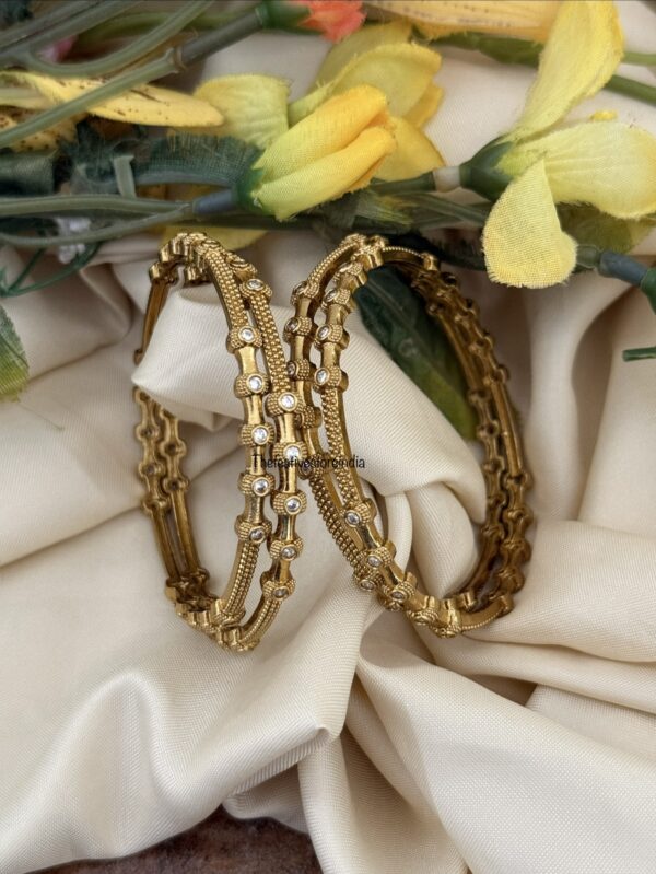 Set of 4 antique polish white stone bangles