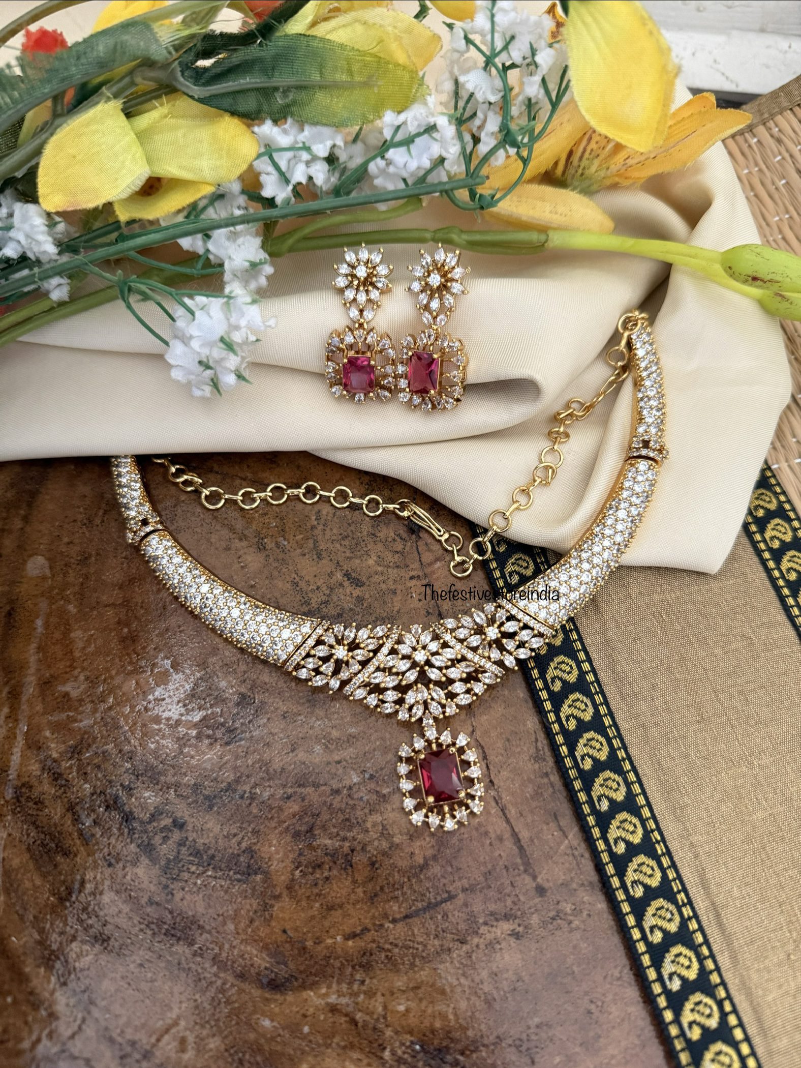 Diamonds kanti with ruby drop pendent set