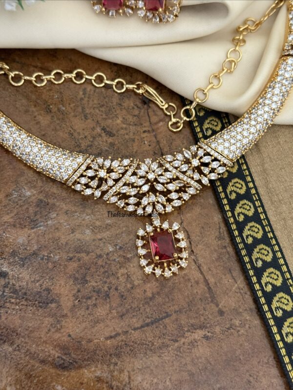 Diamonds kanti with ruby drop pendent set